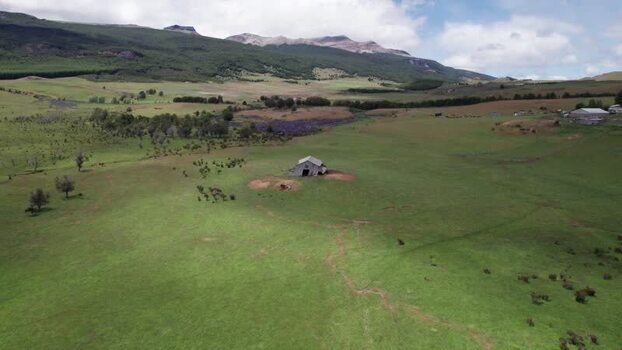 Aerial view of a lonely house in a rural field in Chile. Aerial view of a lonely house in a rural field in Chile.