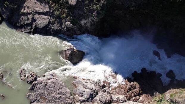 Aerial view of powerful waterfall and river Chile. Aerial view of powerful waterfall and river Chile.