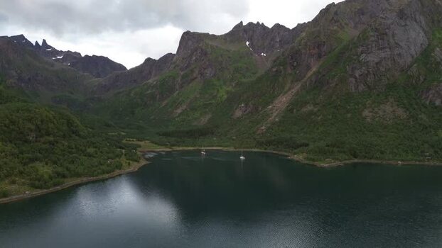 Aerial view of Senja mountains and fjord waters Norway.