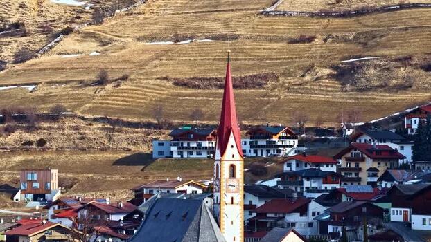 Aerial view of Nauders church and village Austria.