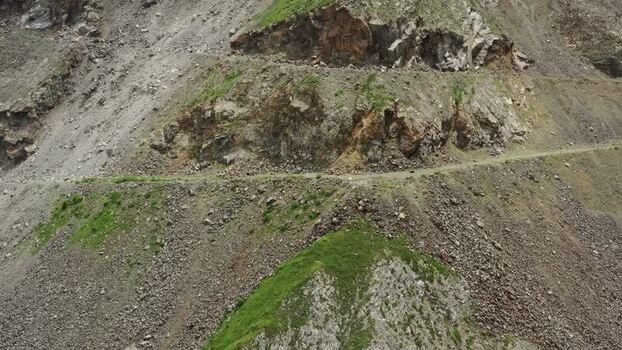 Aerial view of Caucasus Mountains rugged terrain in Russia.