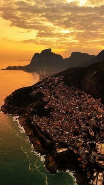 Aerial view of Rocinha favela at sunset in Rio de Janeiro Brazil. Aerial view of Rocinha favela at sunset in Rio de Janeiro Brazil.