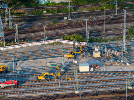 Berlin Germany 20 September 2026 Aerial view of ICE Werk Berlin Rummelsburg showing construction machinery and excavators working on railway tracks. Berlin Germany 20 September 2026 Aerial view of ICE Werk Berlin Rummelsburg showing construction machinery and excavators working on railway tracks.
