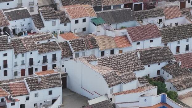 Aerial view of white houses with terracotta roofs Spain.