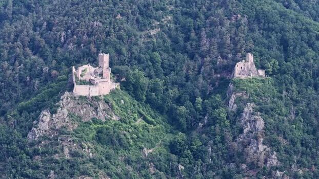 Aerial view of the medieval castle ruins in Ribeauville France. Aerial view of the medieval castle ruins in Ribeauville France.