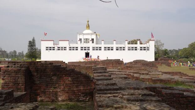 View of the Maya Devi Temple and ancient ruins in Lumbini Nepal.