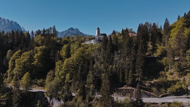Aerial view of a historic church on a hill in Limone sul Garda Italy. Aerial view of a historic church on a hill in Limone sul Garda Italy.