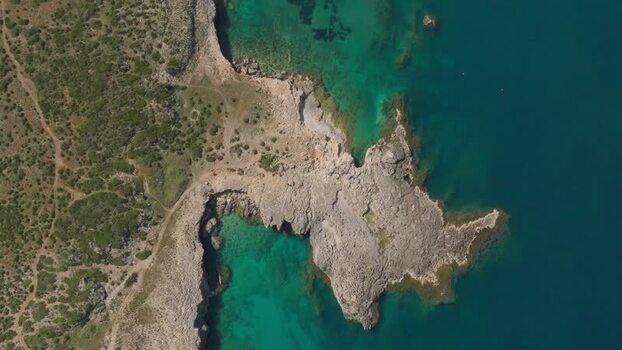 Aerial view of the rocky coastline of Plemmirio Italy.