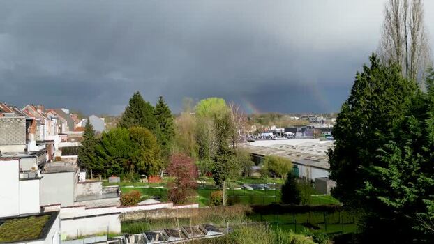 Aerial view of rainbow over Auderghem Belgium. Aerial view of rainbow over Auderghem Belgium.