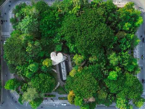 Aerial view of Taman Samarendah surrounded by lush green trees and urban streets in Samarinda East Kalimantan Indonesia. Aerial view of Taman Samarendah surrounded by lush green trees and urban streets in Samarinda East Kalimantan Indonesia.