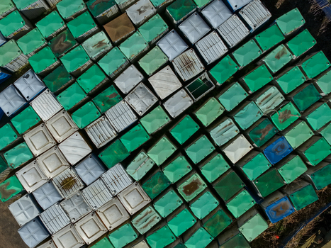 Kilsyth Australia 20 September 2026 Aerial view of a grid of industrial green and white storage containers arranged in rows at a manufacturing facility. Kilsyth Australia 20 September 2026 Aerial view of a grid of industrial green and white storage containers arranged in rows at a manufacturing facility.