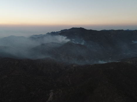 Aerial view of the Sierra de San Miguelito Norte mountain range covered in wildfire smoke during dusk in San Luis Potosi San Luis Potosi Mexico.