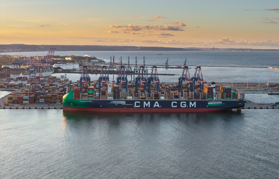 Gdansk Poland 23 September 2026 Aerial view of the Baltic Hub container terminal with a large CMA CGM cargo ship docked at the pier shipping containers and port cranes. Gdansk Poland 23 September 2026 Aerial view of the Baltic Hub container terminal with a large CMA CGM cargo ship docked at the pier shipping containers and port cranes.