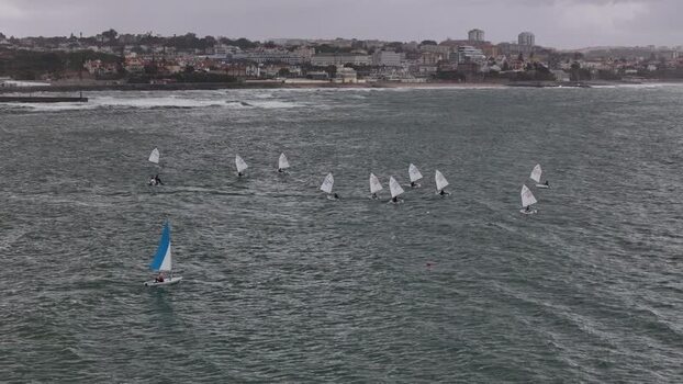 Aerial view of sailboats on the sea near the coast of Portugal. Aerial view of sailboats on the sea near the coast of Portugal.