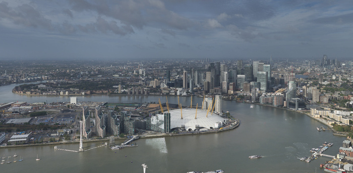 Aerial view of The O2 Arena formerly known as the Millennium Dome situated on the Greenwich Peninsula along the River Thames in London England United Kingdom. Aerial view of The O2 Arena formerly known as the Millennium Dome situated on the Greenwich Peninsula along the River Thames in London England United Kingdom.