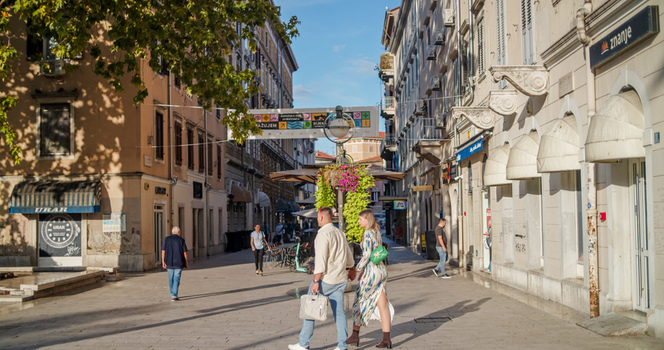 Rijeka Croatia 19 September 2026 View of pedestrians walking along a historic street lined with shops and buildings in Rijeka Primorje Gorski Kotar Croatia. Rijeka Croatia 19 September 2026 View of pedestrians walking along a historic street lined with shops and buildings in Rijeka Primorje Gorski Kotar Croatia.