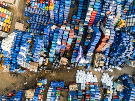Aerial view of thousands of colorful industrial barrels stacked in an outdoor storage facility in Dhaka Dhaka Division Bangladesh. Aerial view of thousands of colorful industrial barrels stacked in an outdoor storage facility in Dhaka Dhaka Division Bangladesh.