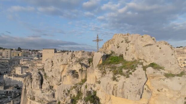 Aerial view of Matera rocky outcrop and historic city Italy.
