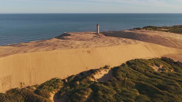 Aerial view of Rubjerg Knude lighthouse in Denmark.