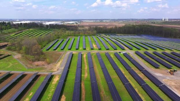 Aerial view of solar panels on a green field in Lebanon United States. Aerial view of solar panels on a green field in Lebanon United States.