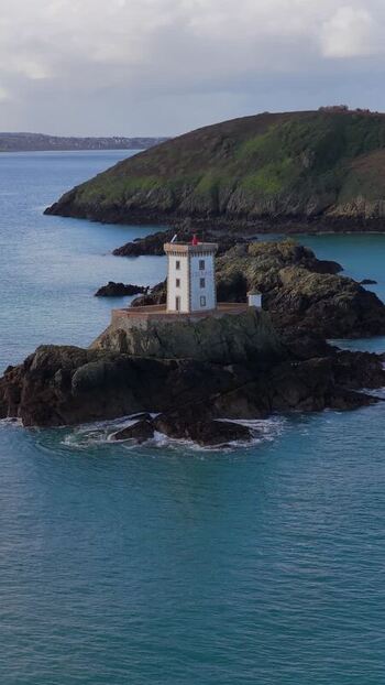 Aerial view of Phare de L Ost Pic lighthouse in France.