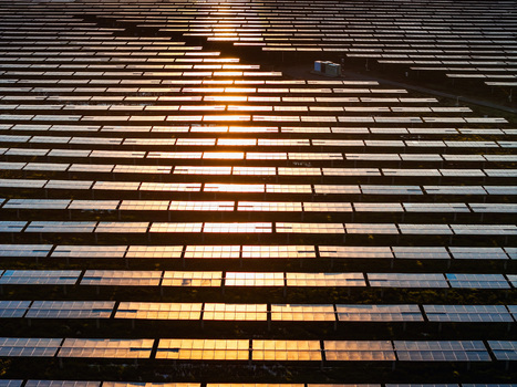 Trino Italy 30 March 2026 Aerial view of a vast solar farm reflecting the golden setting sun creating a grid of light and shadow across the landscape. Trino Italy 30 March 2026 Aerial view of a vast solar farm reflecting the golden setting sun creating a grid of light and shadow across the landscape.
