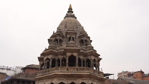 View of the historic Krishna Mandir stone temple Nepal.