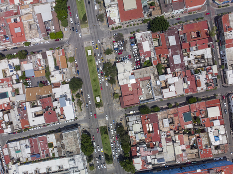 Aerial view of the historic Centro district with dense urban grid terracotta rooftops and busy streets in Guadalajara Jalisco Mexico. Aerial view of the historic Centro district with dense urban grid terracotta rooftops and busy streets in Guadalajara Jalisco Mexico.