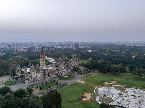 Vadodara India 14 March 2026 Aerial view of Laxmi Vilas Palace with its intricate Indo Saracenic architecture sprawling green gardens and the city skyline in the background. Vadodara India 14 March 2026 Aerial view of Laxmi Vilas Palace with its intricate Indo Saracenic architecture sprawling green gardens and the city skyline in the background.