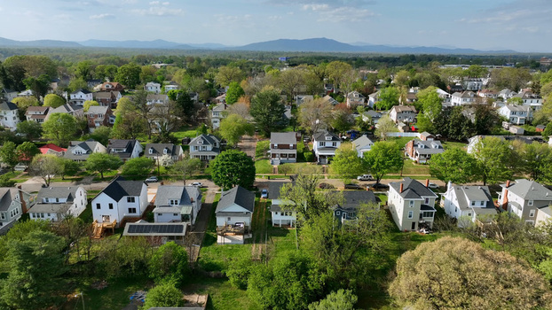 Aerial view of a residential neighborhood with houses lush green trees and streets in Lynchburg Virginia United States.