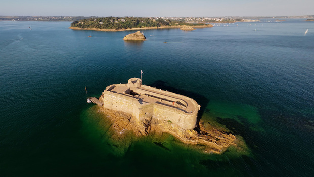 Aerial view of the majestic Château du Taureau a stone fortress standing guard against the turquoise sea Plouezoc h Bretagne France. Aerial view of the majestic Château du Taureau a stone fortress standing guard against the turquoise sea Plouezoc h Bretagne France.