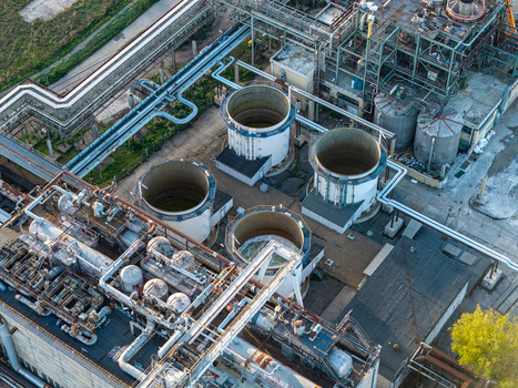 Aerial view of Heizkraftwerk Klingenberg combined heat and power plant with large industrial cooling towers complex piping systems and metal structures in Berlin Berlin Germany. Aerial view of Heizkraftwerk Klingenberg combined heat and power plant with large industrial cooling towers complex piping systems and metal structures in Berlin Berlin Germany.
