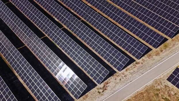 Aerial view of solar panels in a field Serbia.