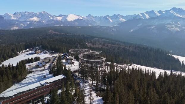 Aerial view of SkyWalk Serce Poronina over snowy Tatra landscape Aerial view of SkyWalk Serce Poronina over snowy Tatra landscape
