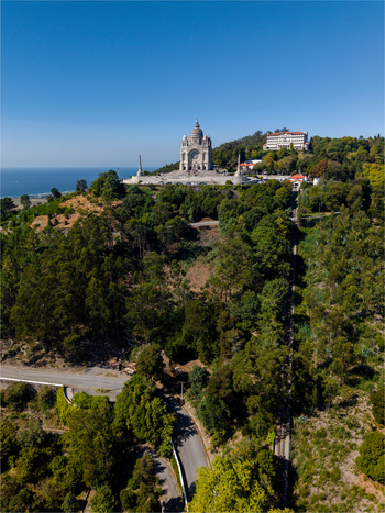 Aerial view of the Sanctuary of the Sacred Heart of Jesus on Monte de Santa Luzia surrounded by forest and roads overlooking the sea in Viana do Castelo Viana do Castelo Dist Portugal. Aerial view of the Sanctuary of the Sacred Heart of Jesus on Monte de Santa Luzia surrounded by forest and roads overlooking the sea in Viana do Castelo Viana do Castelo Dist Portugal.