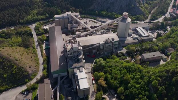 Aerial view of an industrial cement plant with silos Czechia. Aerial view of an industrial cement plant with silos Czechia.