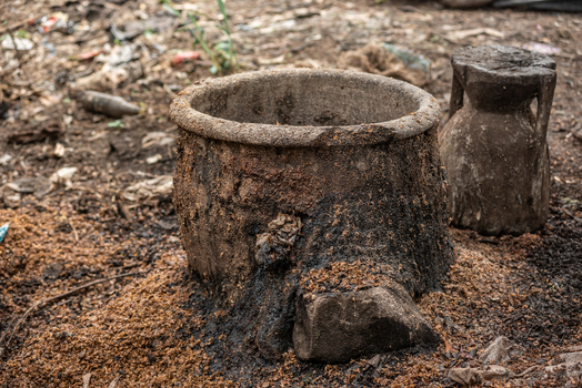 View of traditional weathered clay pots resting on the ground in a rural setting in Jos North Plateau Nigeria. View of traditional weathered clay pots resting on the ground in a rural setting in Jos North Plateau Nigeria.