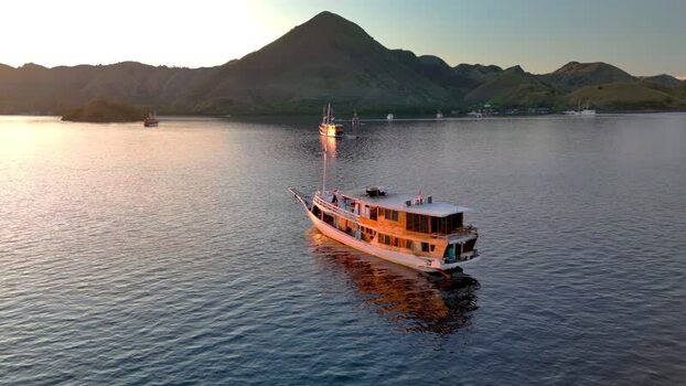Aerial view of a phinisi boat in Komodo National Park Indonesia. Aerial view of a phinisi boat in Komodo National Park Indonesia.