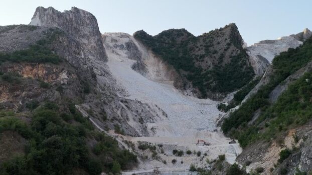 Aerial view of Carrara marble quarries in the mountains Italy. Aerial view of Carrara marble quarries in the mountains Italy.