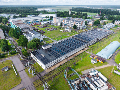 Olaine parish Olaine Municipality Latvia 04 July 2026 Aerial view of an industrial complex with solar panels storage tanks and surrounding green fields. Olaine parish Olaine Municipality Latvia 04 July 2026 Aerial view of an industrial complex with solar panels storage tanks and surrounding green fields.