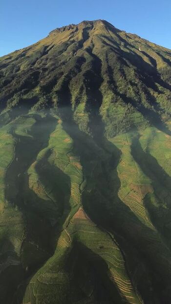 Aerial view of Glapansari mountain terraces in Parakan Indonesia.