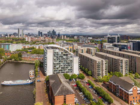 Aerial view of MediaCityUK and the modern residential developments along the Manchester Ship Canal in Salford England United Kingdom. Aerial view of MediaCityUK and the modern residential developments along the Manchester Ship Canal in Salford England United Kingdom.