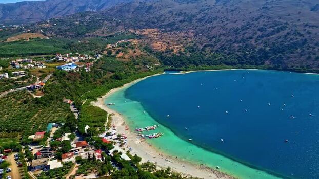 Aerial view of Lake Kournas and surrounding hills Greece.