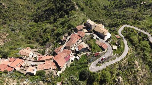 Aerial view of the historic hilltop village of Savoca Italy. Aerial view of the historic hilltop village of Savoca Italy.