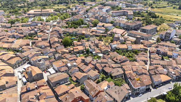Aerial view of the historic town with its characteristic terracotta rooftops narrow streets and stone buildings in Allariz Province of Ourense Spain. Aerial view of the historic town with its characteristic terracotta rooftops narrow streets and stone buildings in Allariz Province of Ourense Spain.