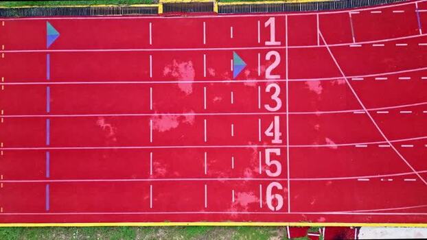 Aerial view of a red running track with lane numbers in Mexico. Aerial view of a red running track with lane numbers in Mexico.