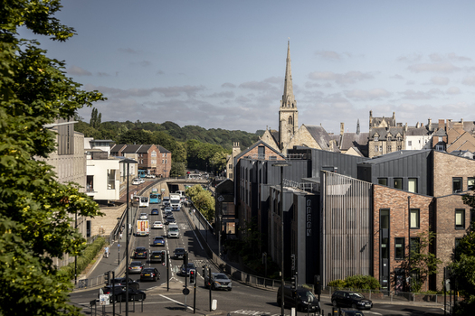 Durham England United Kingdom 13 July 2026 View of the historic city of Durham with its iconic cathedral spire rising above modern buildings and a busy road with traffic. Durham England United Kingdom 13 July 2026 View of the historic city of Durham with its iconic cathedral spire rising above modern buildings and a busy road with traffic.