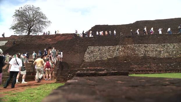 View of tourists at Sigiriya rock fortress Sri Lanka.