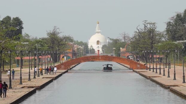 View of World Peace Pagoda and canal in Lumbini Nepal.