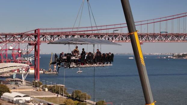 Aerial view of Dinner in the Sky suspended over the Tagus Portugal. Aerial view of Dinner in the Sky suspended over the Tagus Portugal.